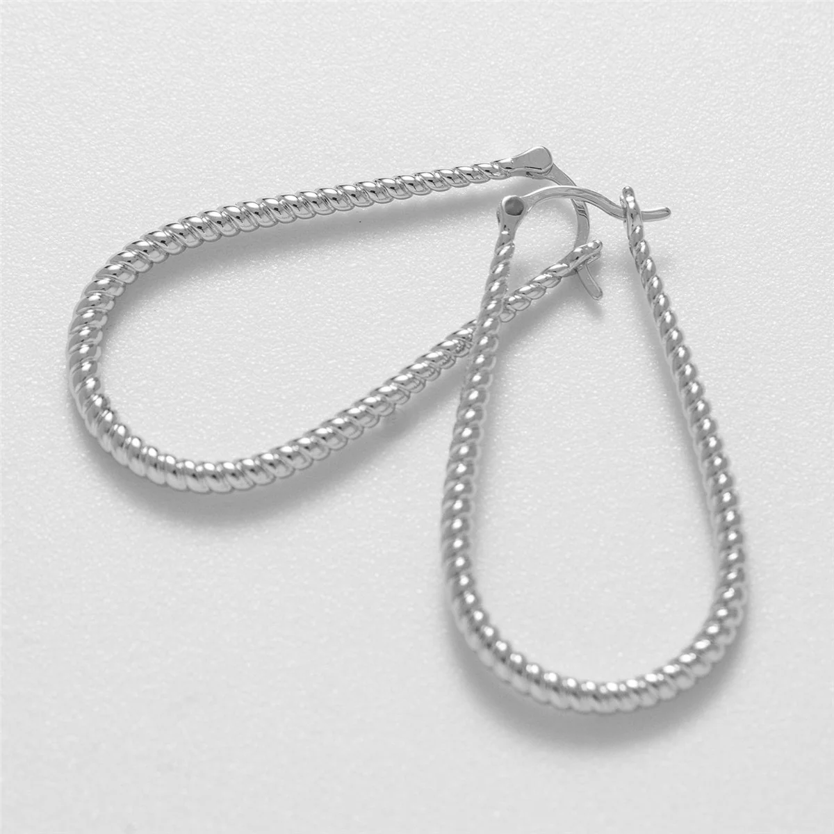 Angelica 18k White Gold Plated 45mm Twisted U-Shaped Hoop Earrings - Image 9